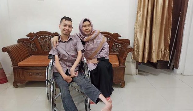 Kisah Inspiratif Khairil Fikri, Disabilitas Daksa Asal Aceh yang Mudik Sendiri Ditemani Kursi Roda